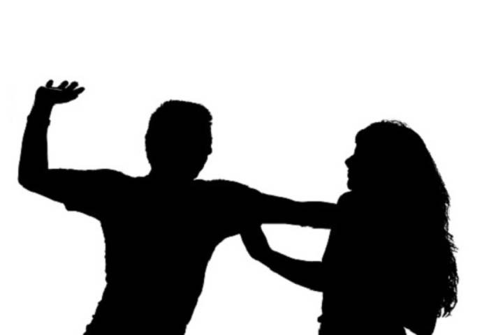 women beating shadow
